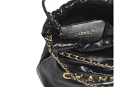 CHANEL 22 MINI HANDBAG Shiny Calfskin & Gold-Tone Metal Black