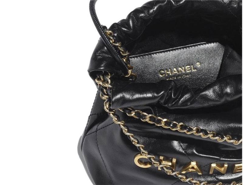 CHANEL 22 MINI HANDBAG Shiny Calfskin & Gold-Tone Metal Black